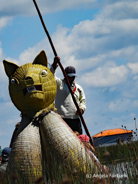 reed boat with puma head