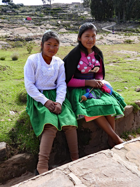 2 girls sitting