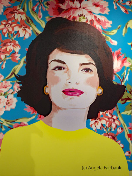 painting of jacki onassis in colourful shop