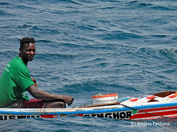 man fishing in boat