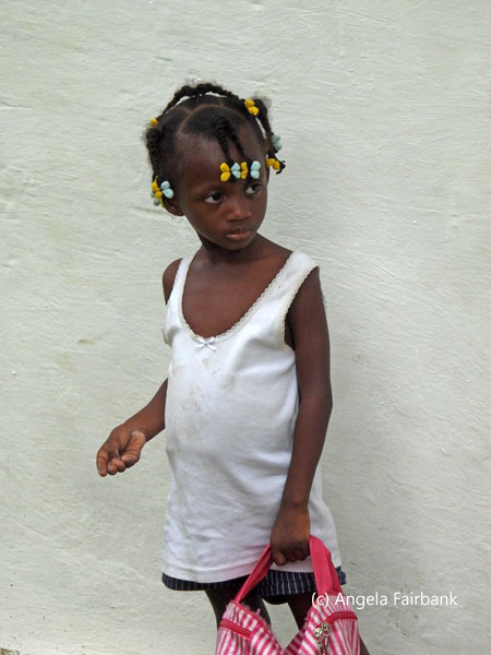 girl against white wall