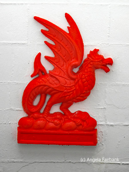 red dragon on white wall