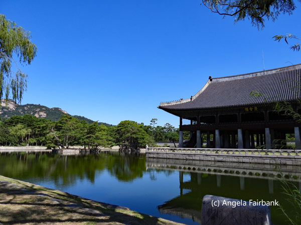 palace building reflected in water