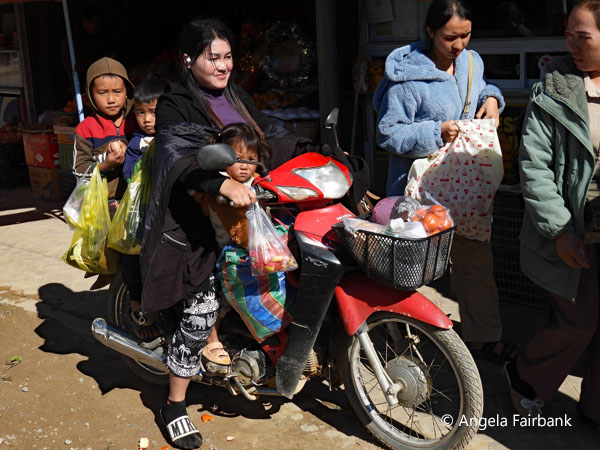 family of 4 on motorbike