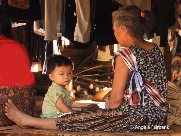 grandma with grandson in Ta Oiy village