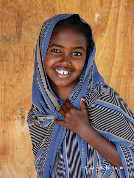 similing girl facing forward