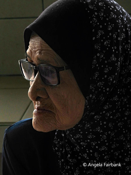 old woman in market 1