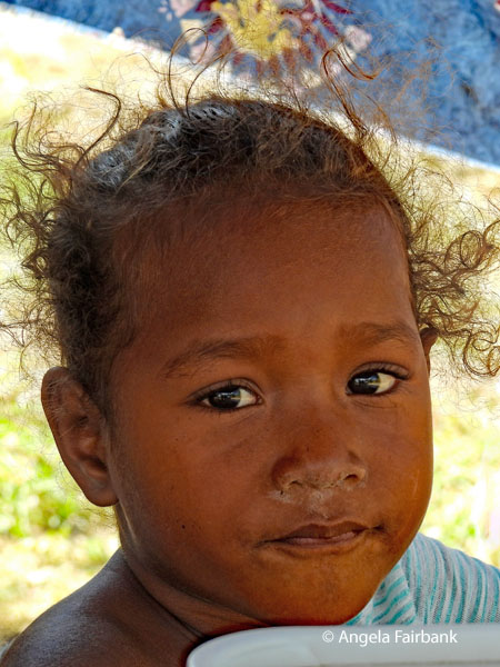 girl at fruit stall