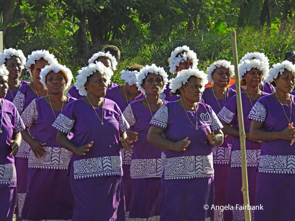 singing dancers at market