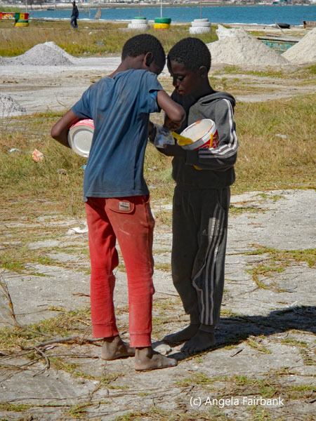 two boys in salt fields