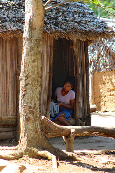 woman in hut