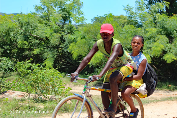 boy and girl on bike