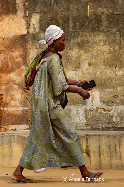 woman walking with phone