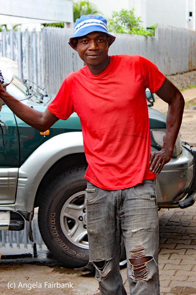young man outside market