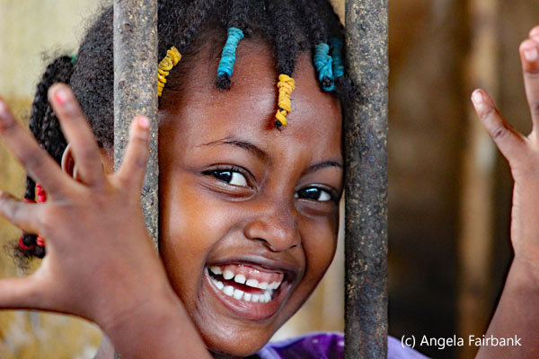 smiling girl at market