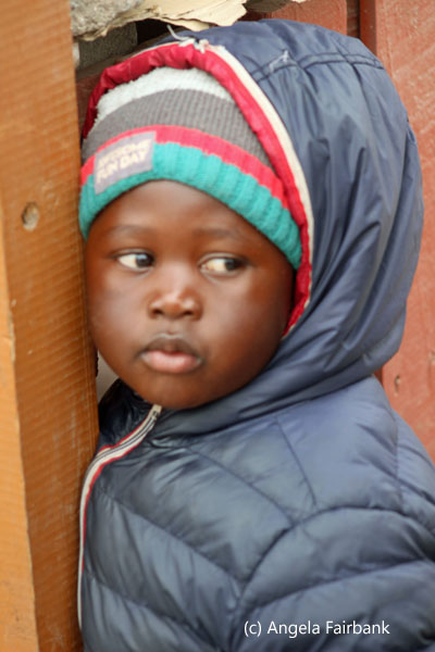 boy in grey ski jacket