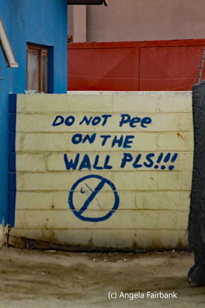 do not pee sign