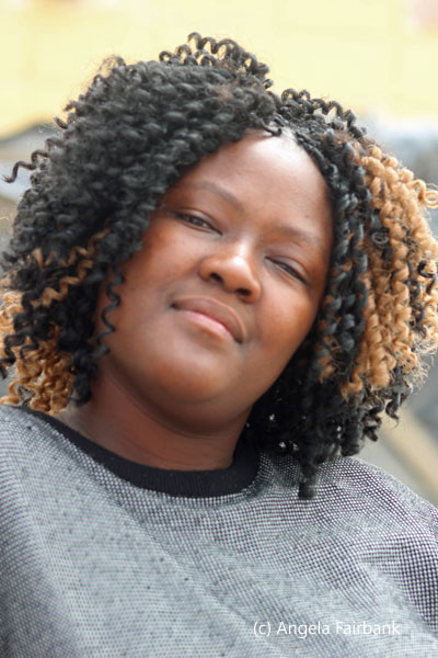 young woman in greey shirt