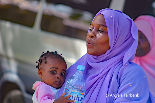 woman holding baby