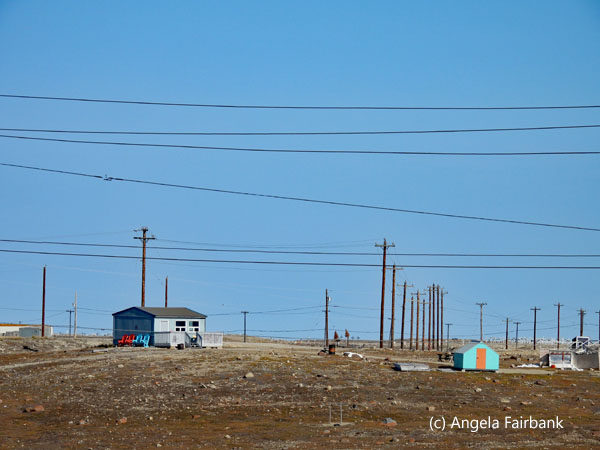 bright buildings and electricity poles