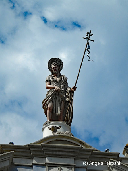 figure on top of dominican church