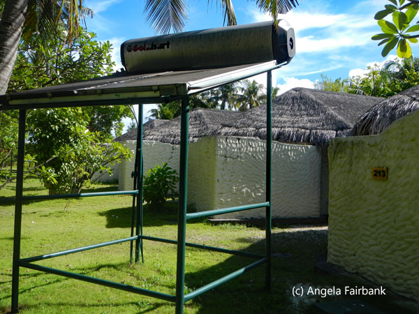 solar panel behind beach hut