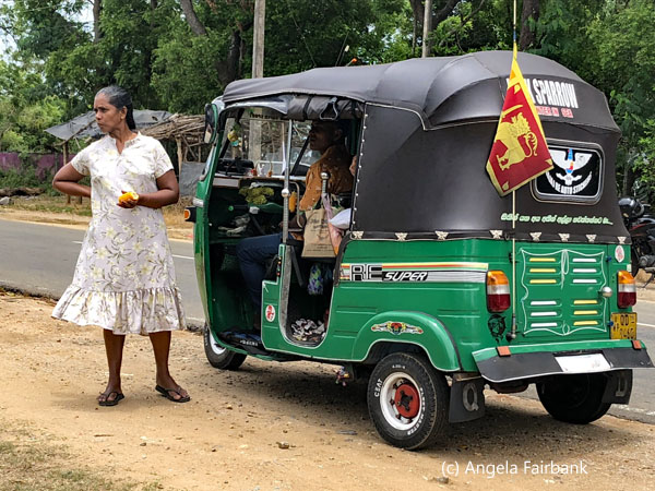 woman by tuk tuk